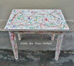 Uma mesa colorida à la Pollock